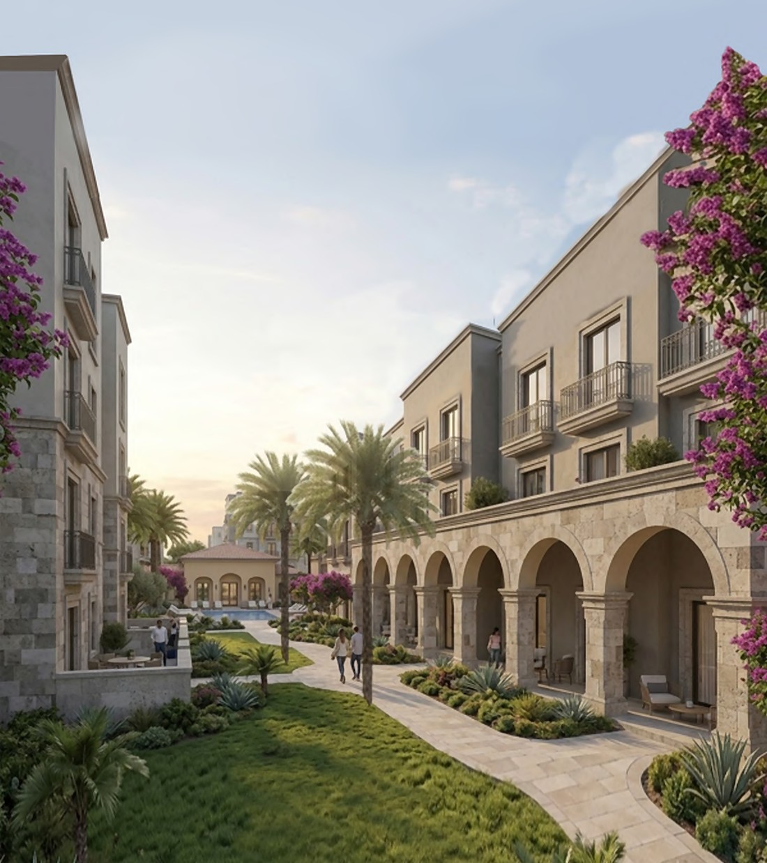Stone arcades and a landscaped paseo leading to the clubhouse and pool at San Felipe at Cimarron